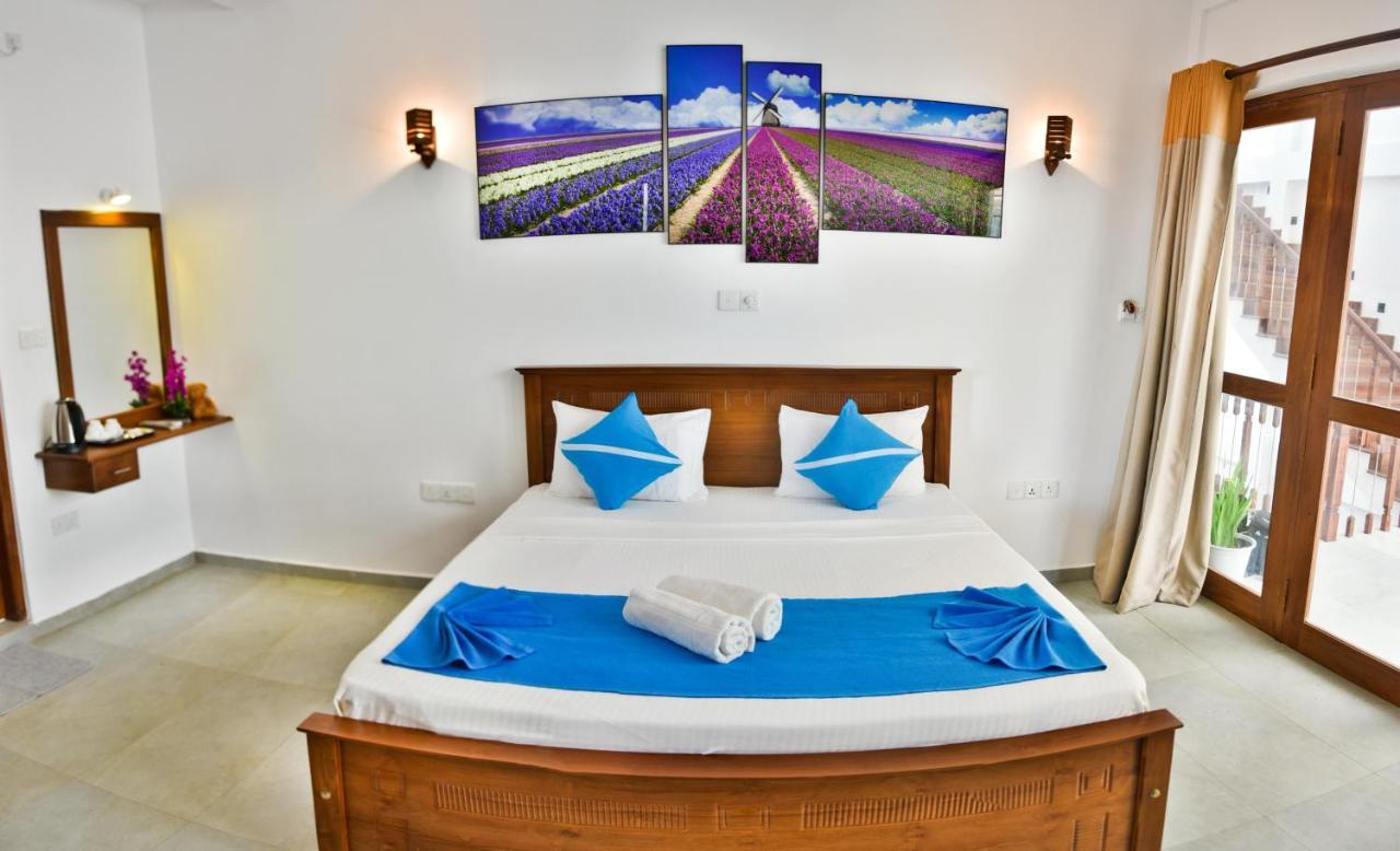 Rominrich Hotel Hikkaduwa Buitenkant foto